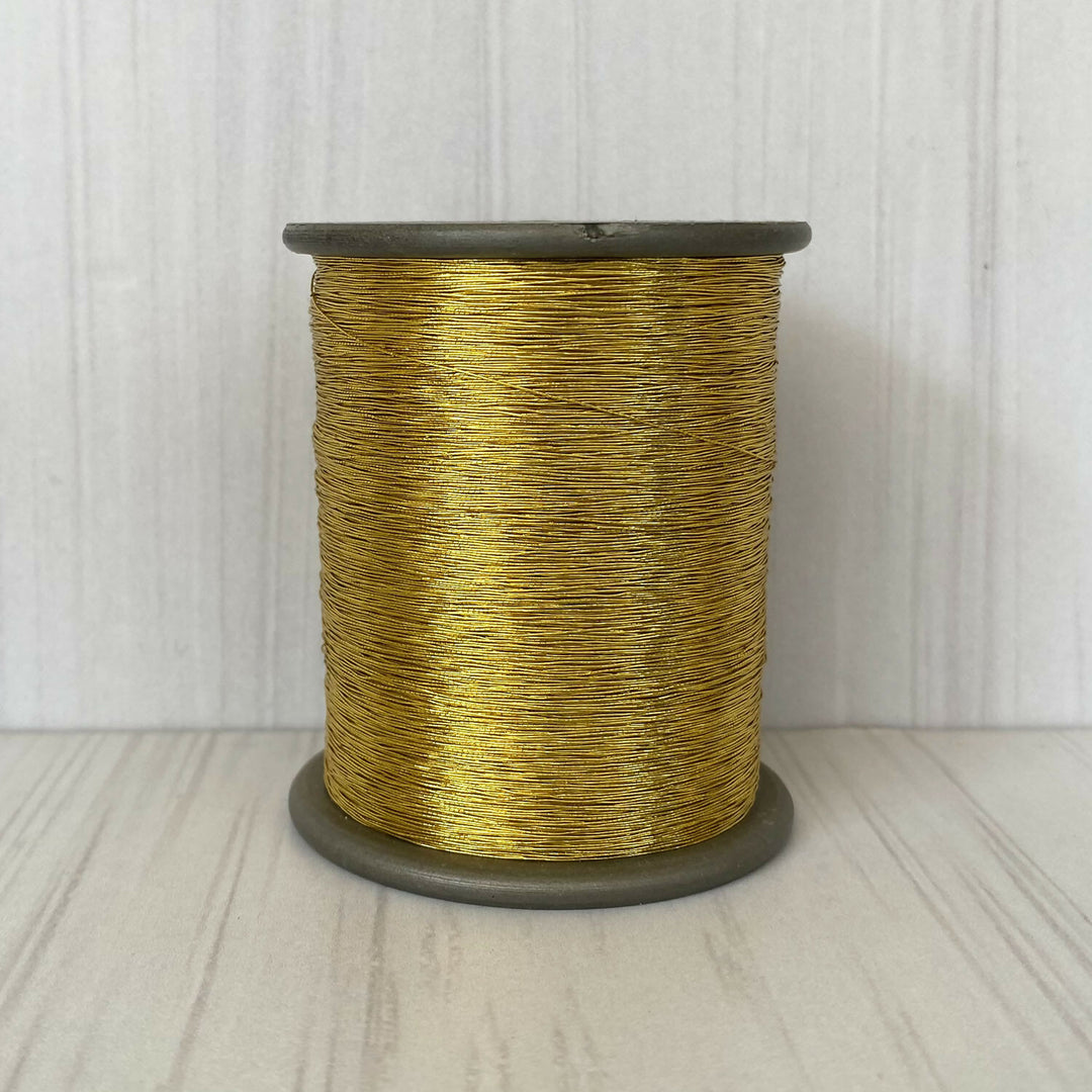 Hilo metalizado delgado