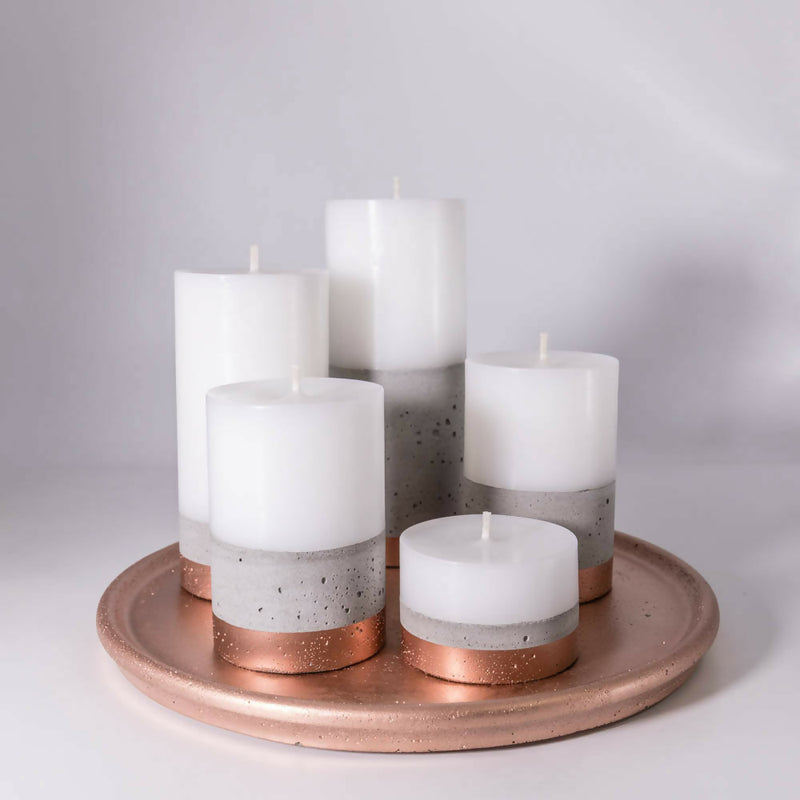 Set de velas con base de hormigón línea cobre en bandeja color cobre