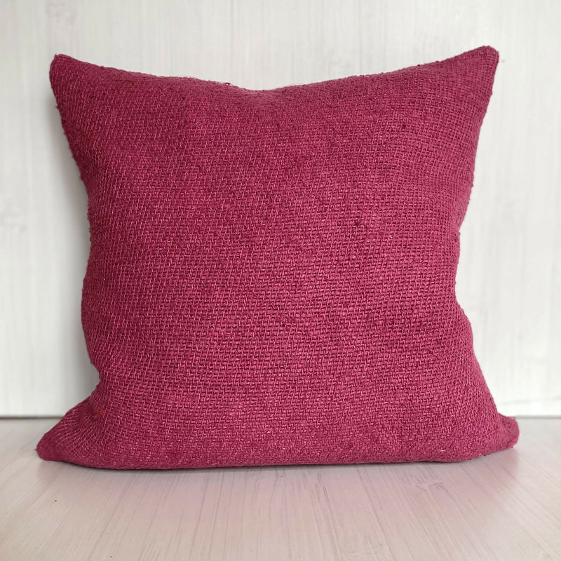 Cojín rústico rosado