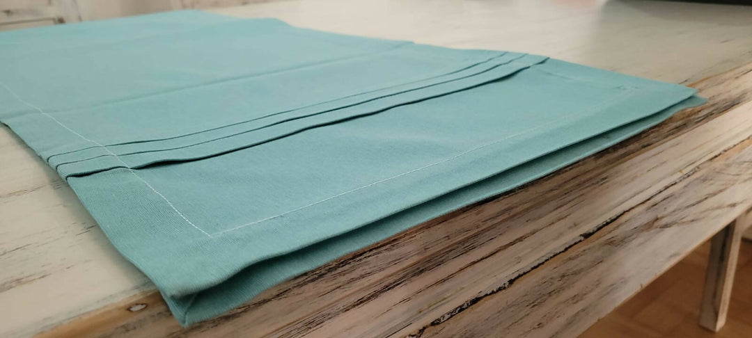 Camino de mesa algodon color calipso con alforzas